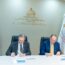 Director ejecutivo de FIBA, David Schwartz y el ministro de Hacienda y Economía, Magín Díaz